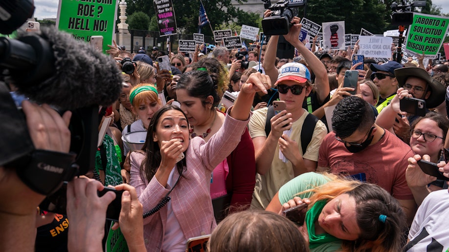 AOC outside Supreme Court
