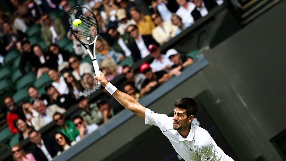 Novak Djokovic hits his serve