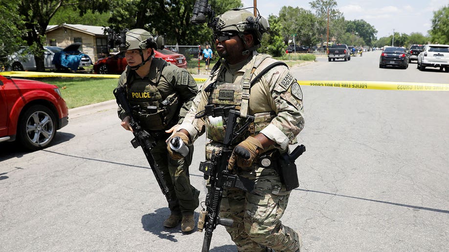 Law enforcement officers respond to school shooting at Uvalde, Texas