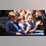 Cambridge children wave during parade