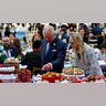 Prince Charles looks at Oval cricket ground decorations