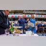 Prince Charles converses with guest