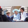 Kate, Camilla, and George riding in a carriage during Trooping of the Colour