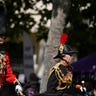 William and Anne ride horseback during Trooping