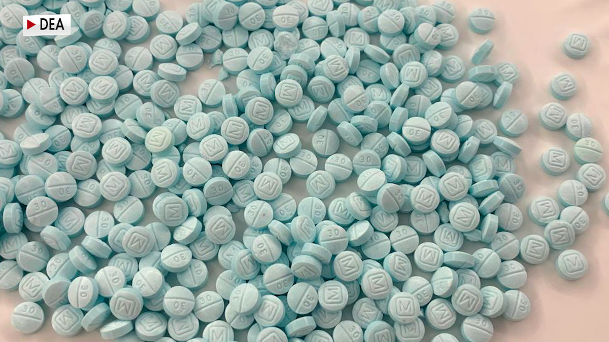 A large pile of fake pills made to look like real prescription pills.