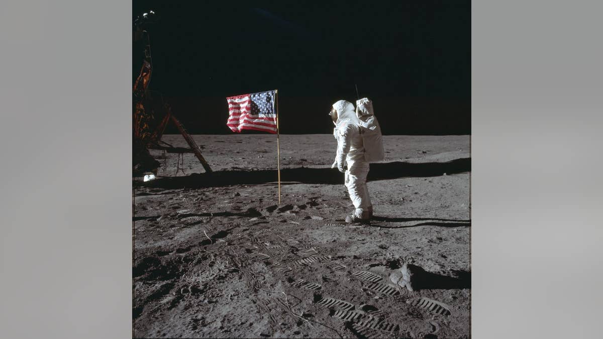 U.S. emblem connected satellite Apollo 11 mission