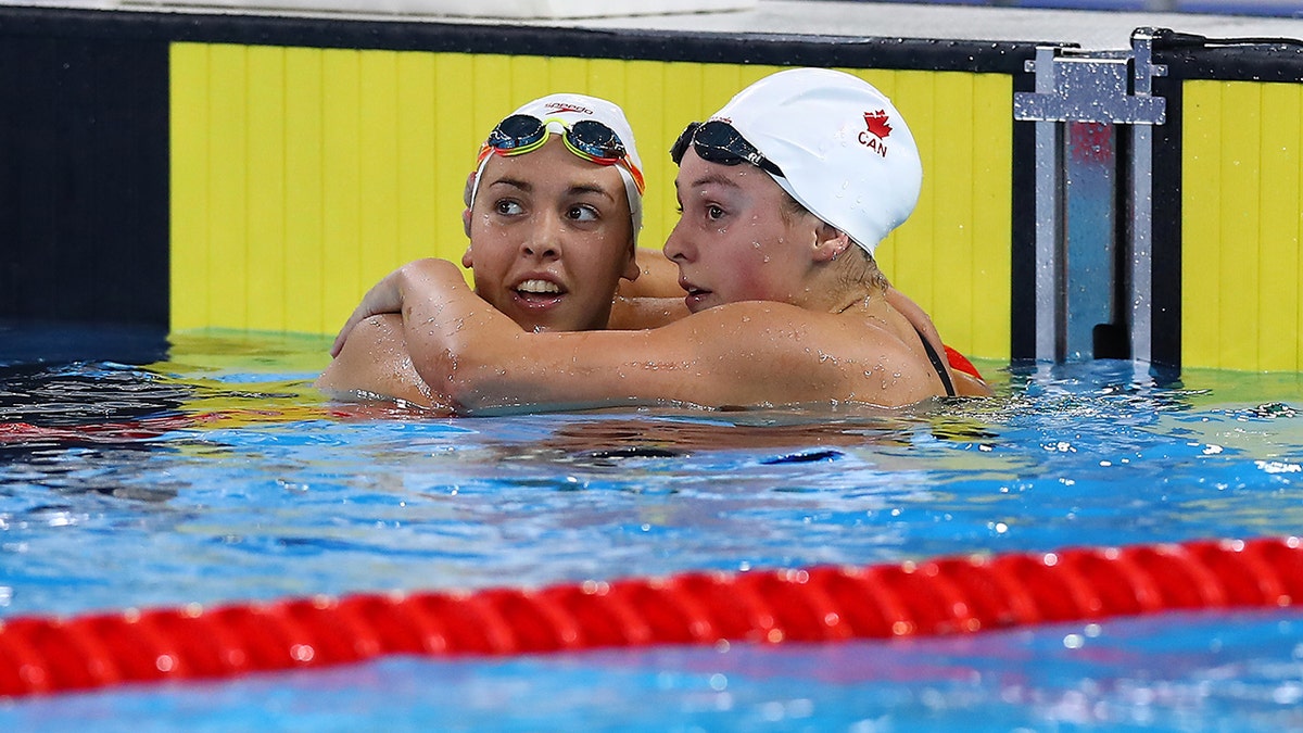 Mary-Sophie Harvey celebrates with a teammate in 2019