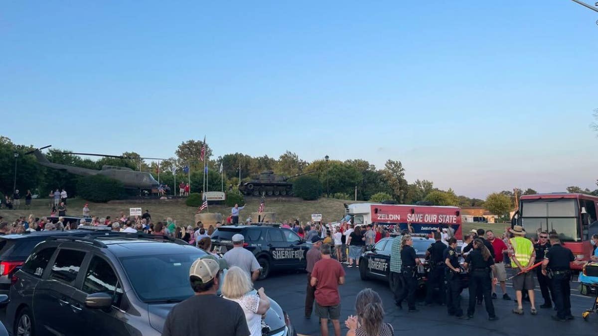 A crowd is pictured near the scene of the alleged attack on Rep. Lee Zeldin