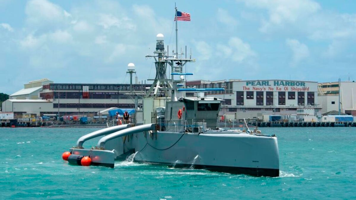 Navy water drone in front of Pearl Harbor