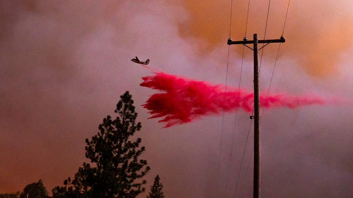 Plane drops retardant in California