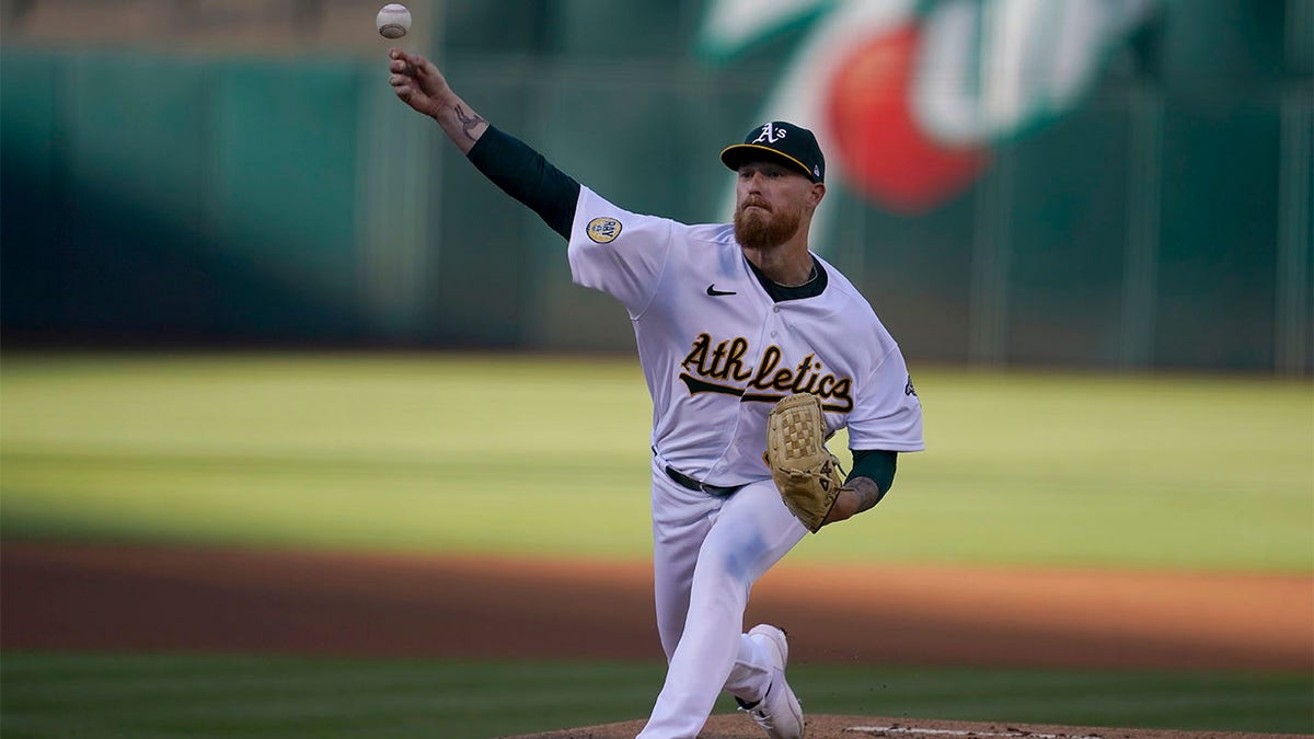 Oakland Athletics left fielder Tony Kemp is unable to catch the double hit  by Detroit Tigers' Zack Short during the fourth inning of a baseball game,  Thursday, July 6, 2023, in Detroit. (