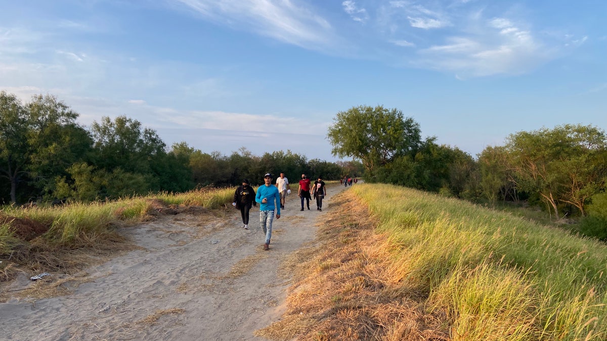 People cross U.S.-Mexico border