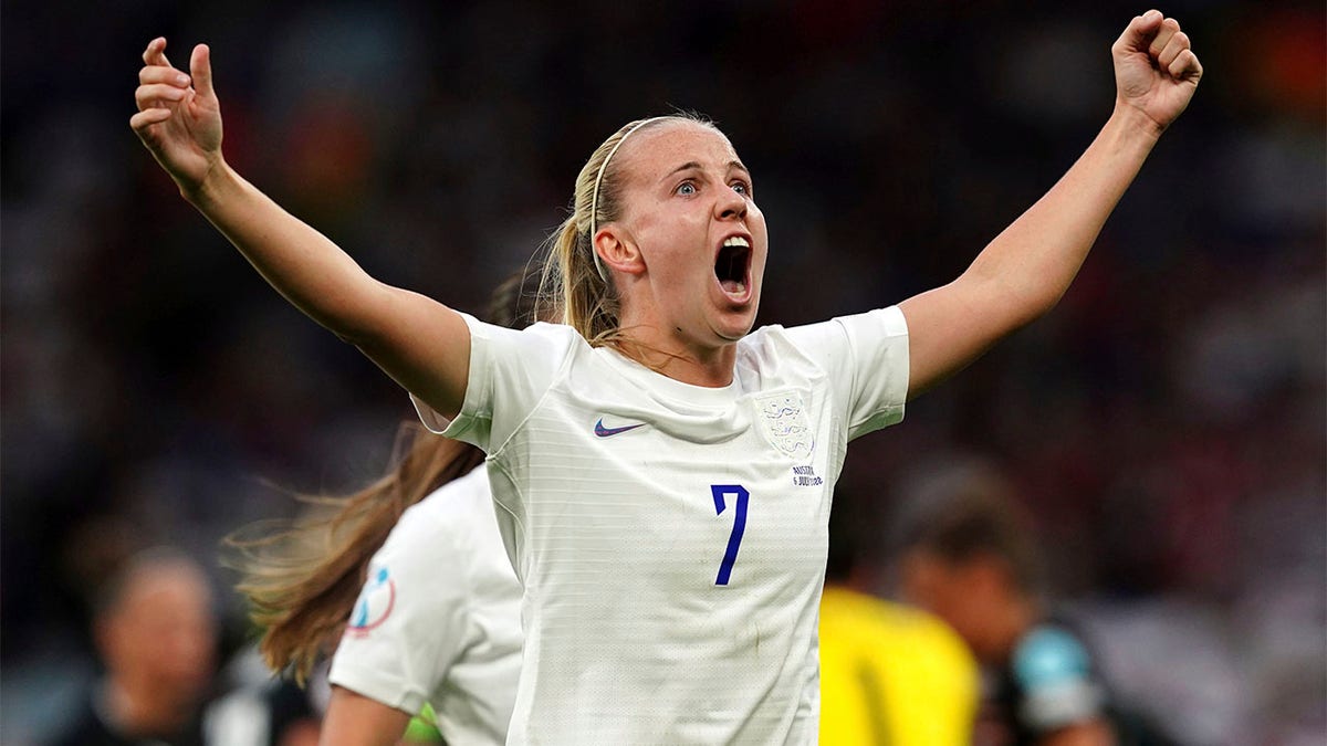 Beth Mead celebrates after scoring a goal