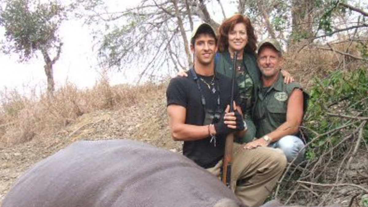 Bianca and Lawrence Rudolph with their son on a hunting trip
