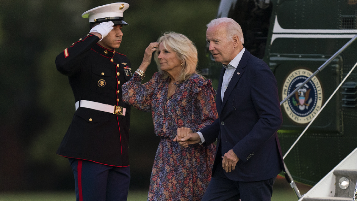 President Biden and Jill Biden walking together