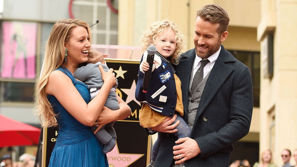 Blake Lively and Ryan Reynolds with their two children in 2016