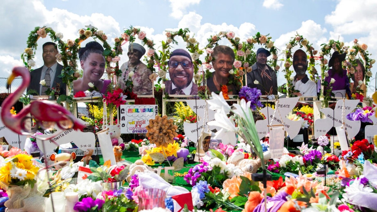 Bufflo shooting memorial shows victims' faces with wreaths around them