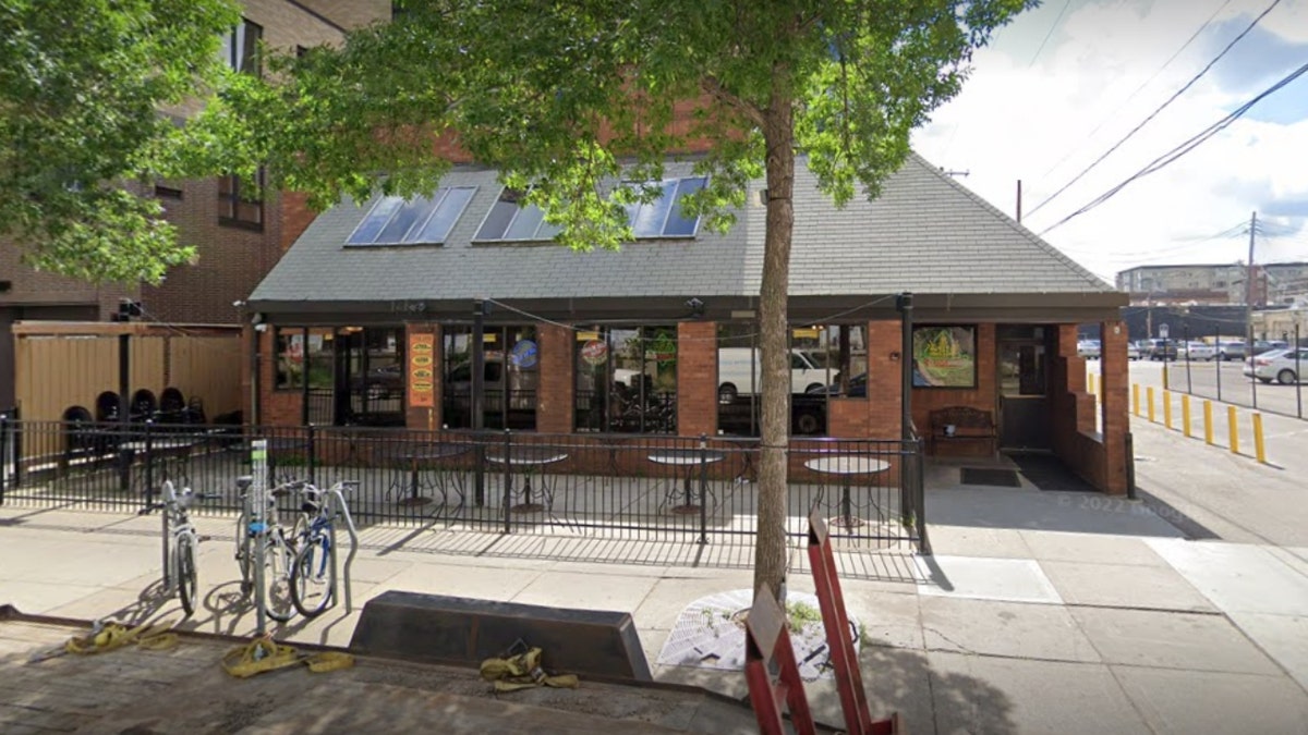 Burrito Loco restaurant building in Minneapolis with empty tables outside