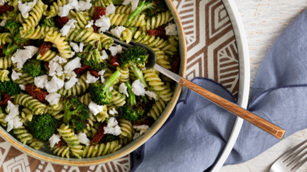 Above view of broccoli pasta salad in a bowl