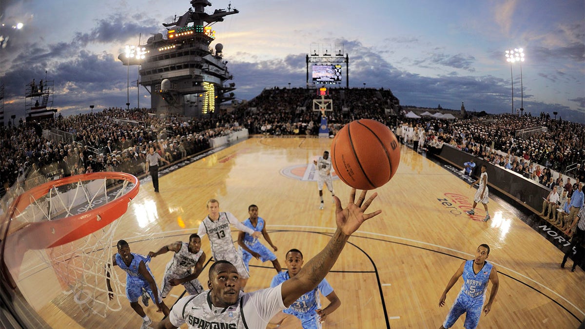 Players play on the carrier court