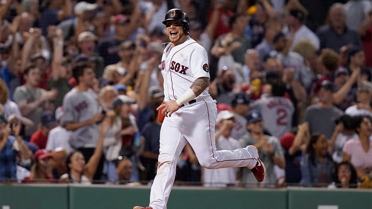 Christian Vazquez celebrates rounding the bases