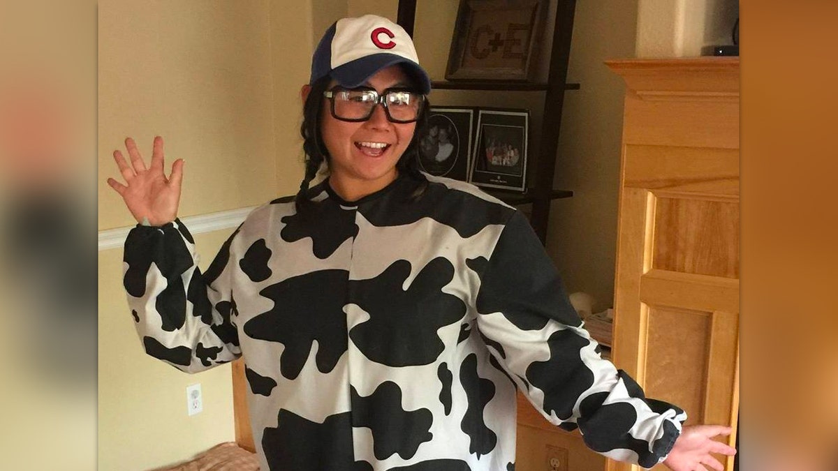 Christe Chen Dawson poses in a cow costume