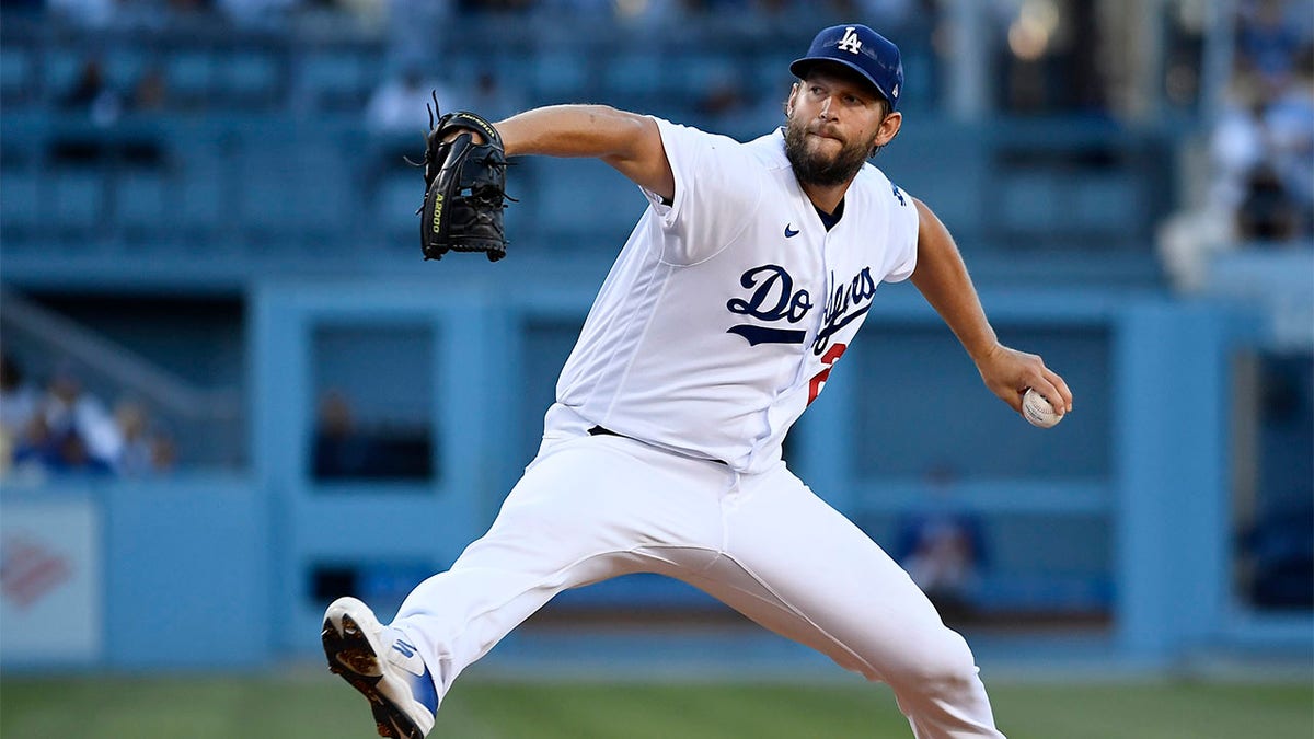 Clayton Kershaw delivering