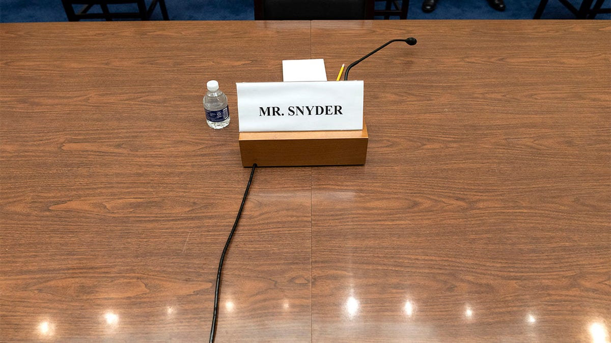 Dan Snyder's name on a desk before hearing