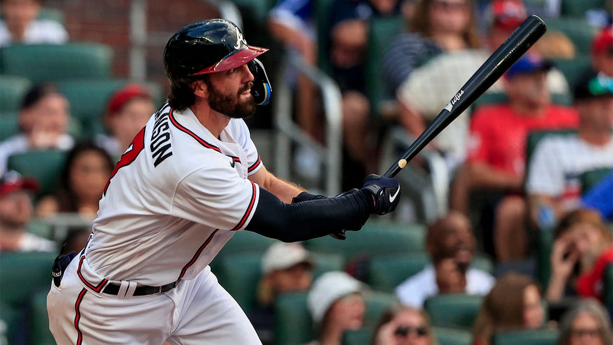 Dansby Swanson follows through on swing