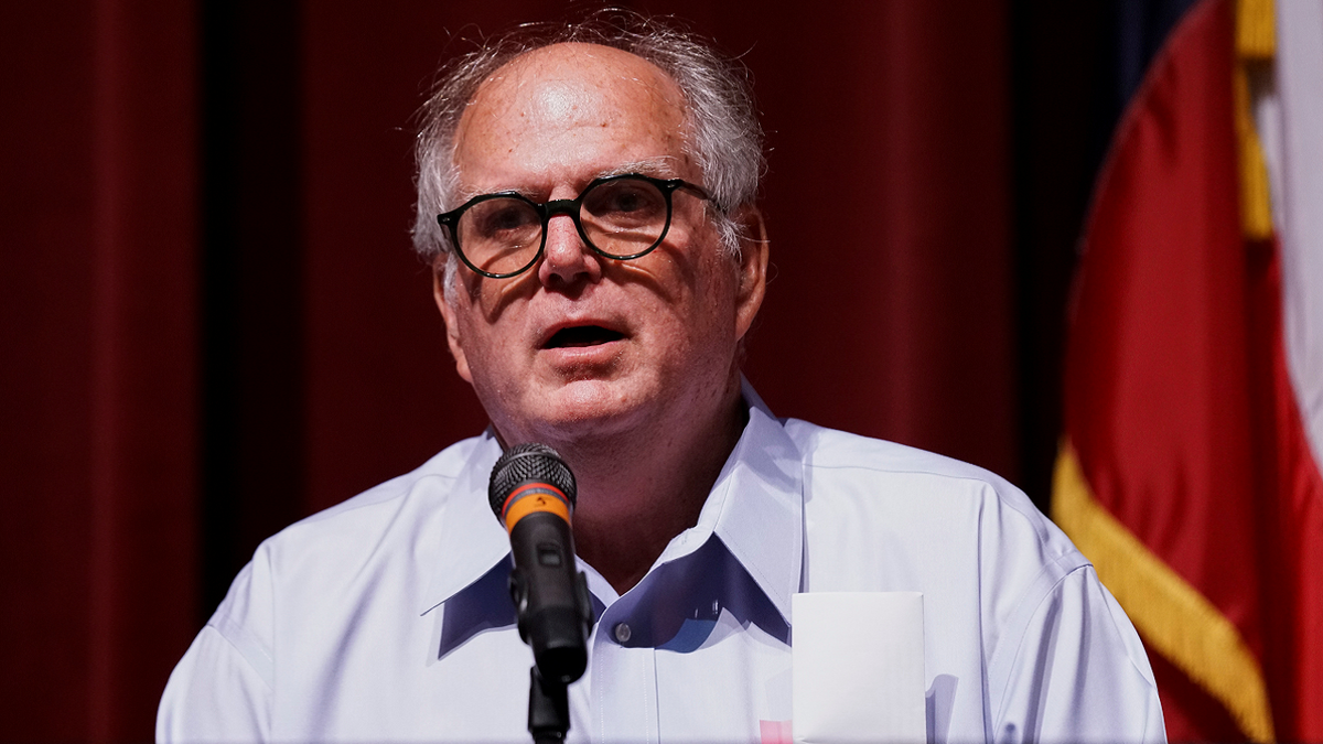 Don McLaughlin speaking to the press