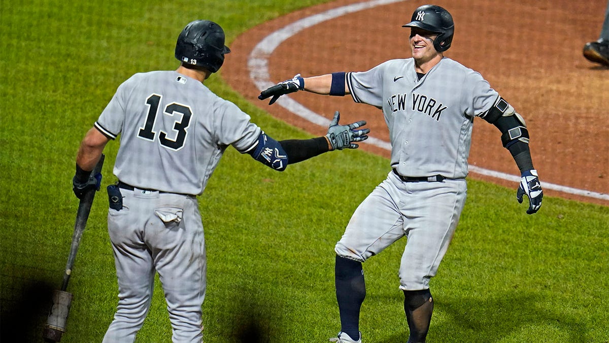 Joey Gallo and Josh Donaldson celebrate