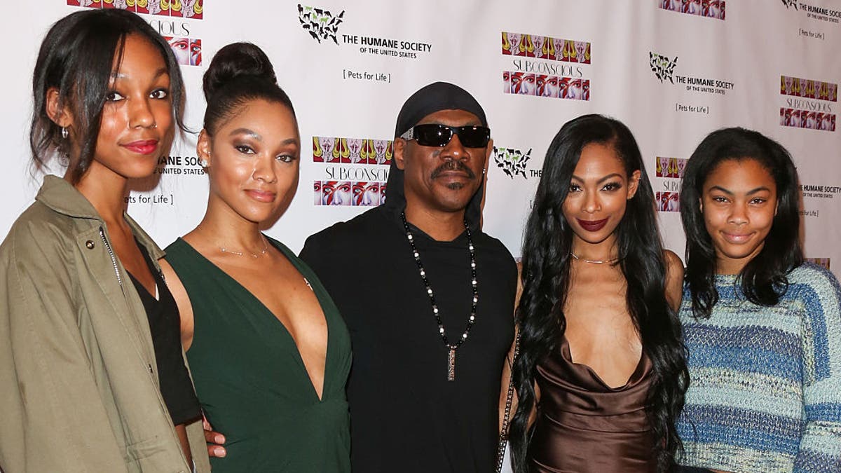 Eddie Murphy is joined by his daughters