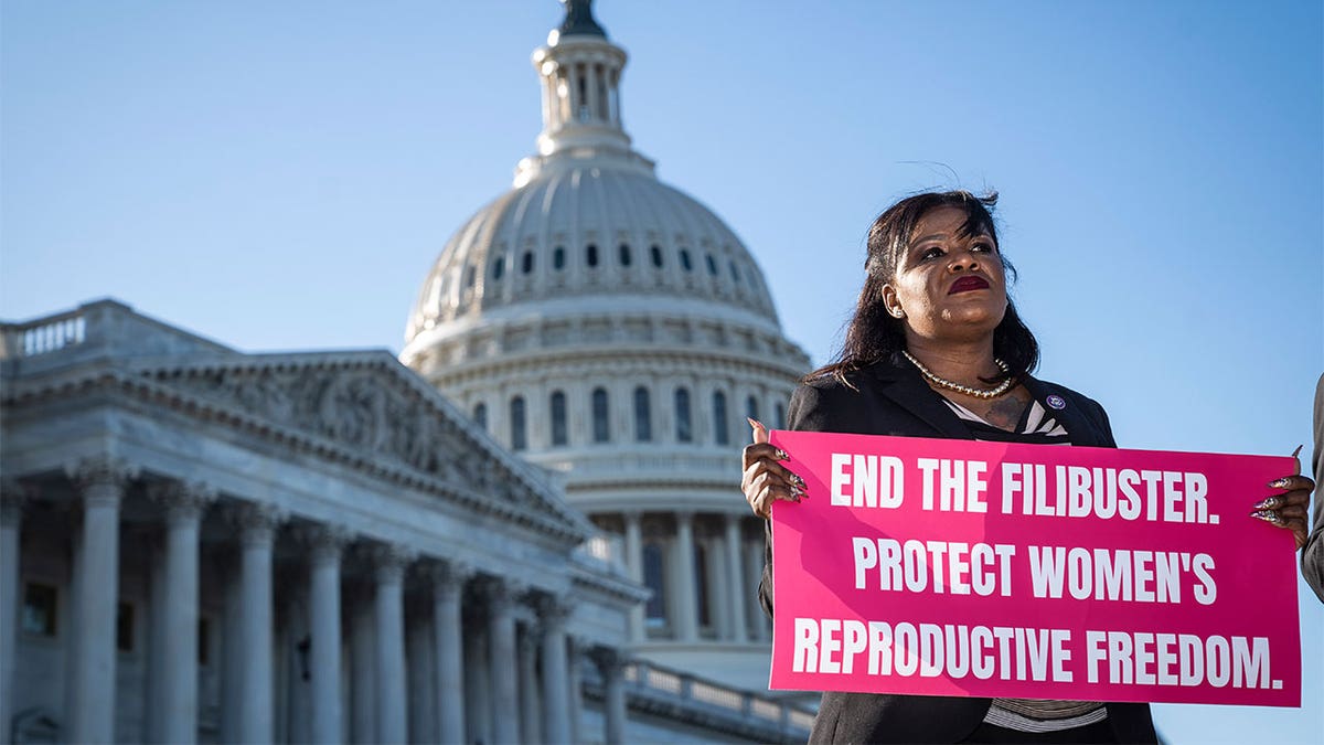 Rep. Sean Casten, D-Ill., speaks with other Democratic lawmakers during a press conference to call on Senators to end the filibuster for abortion rights on Capitol Hill on Tuesday, May 10, 2022 in Washington, DC.