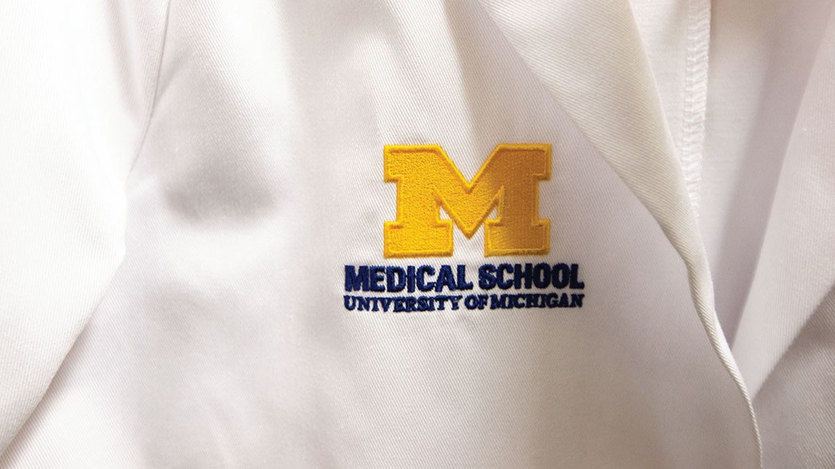 An embroidered "M" with the words "University of Michigan Medical School"