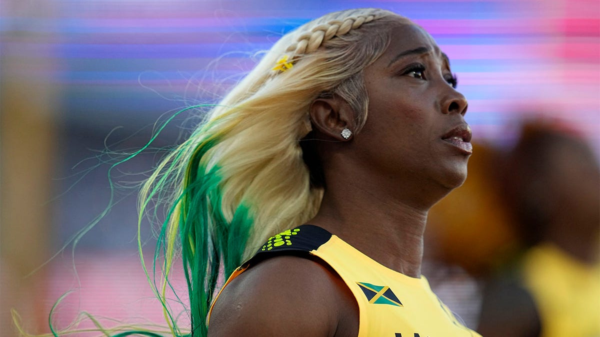 Shelly-Ann Fraser-Pryce reacts after winning