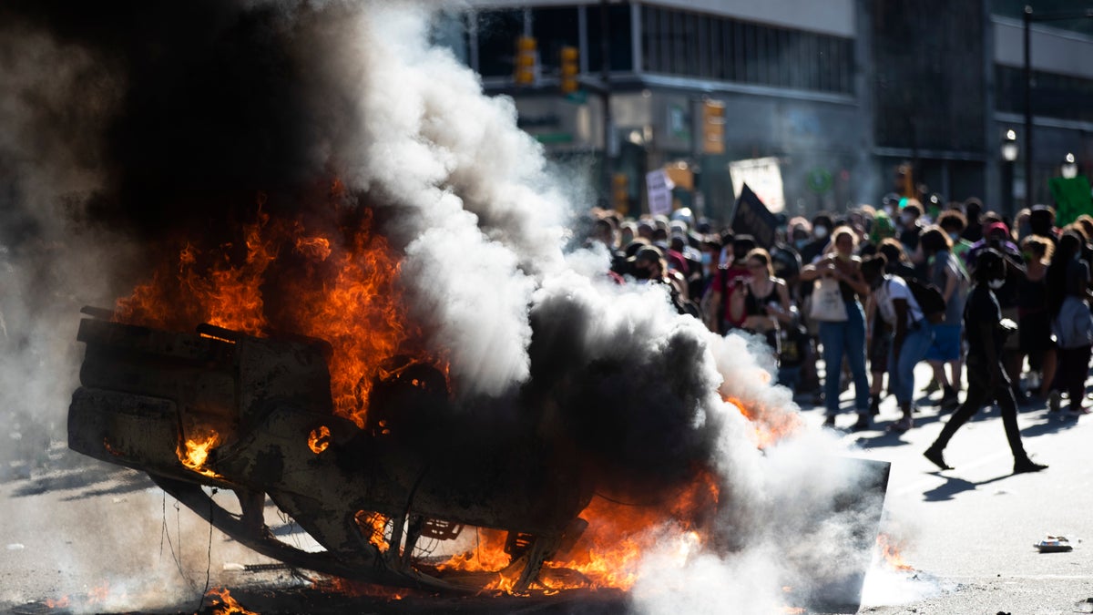 police car set on fire during george floyd riot