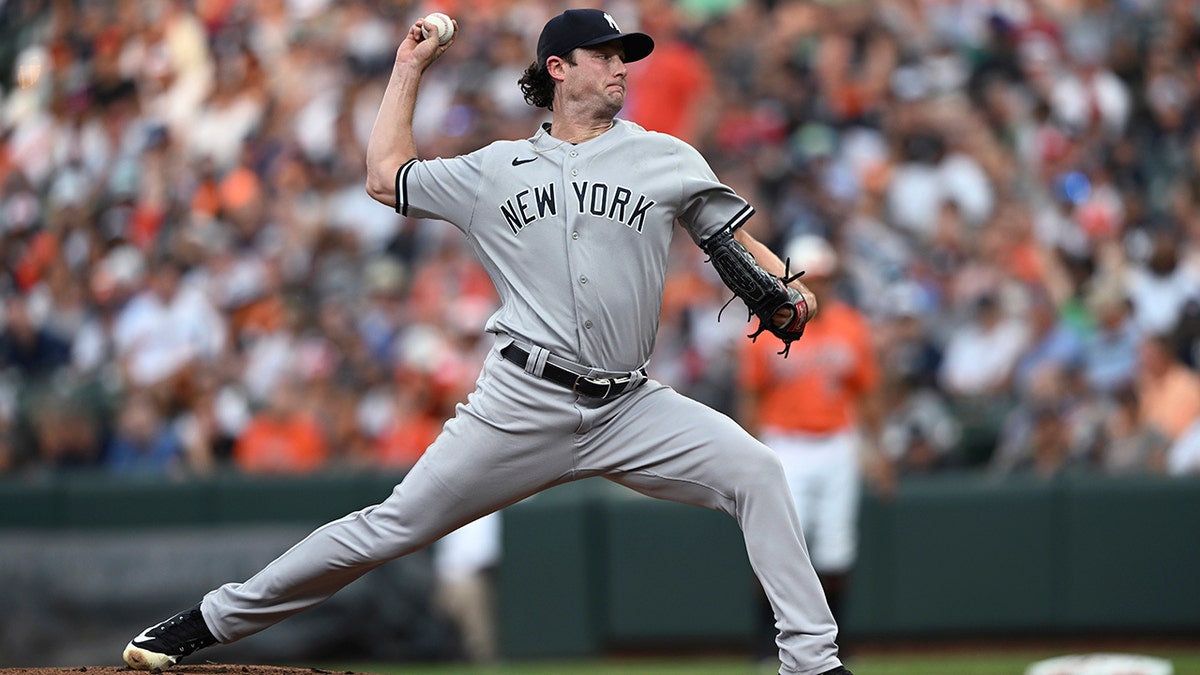 Gerrit Cole throws a pitch