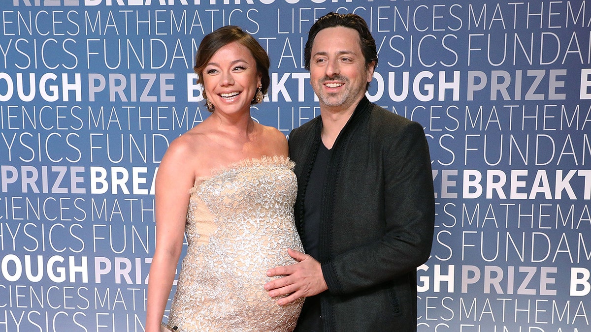 A photo of a pregnant Nicole Shanahan and her husband Sergey Brin