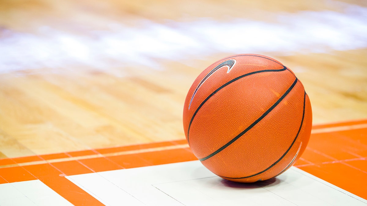 Basketball on empty court