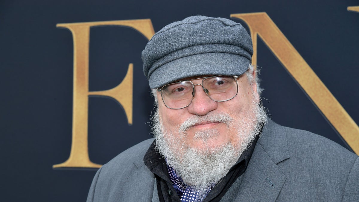 Geroge R.R. Martin poses for a photo