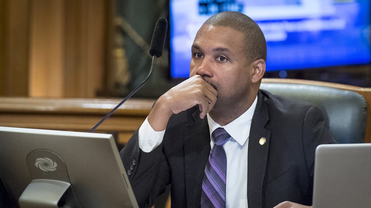 Shamann Walton at board meeting