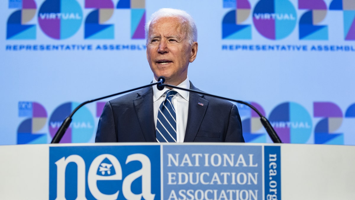 President Joe Biden speaks at the NEA