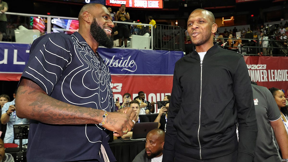 LeBron James talks with James Jones at NBA Summer League