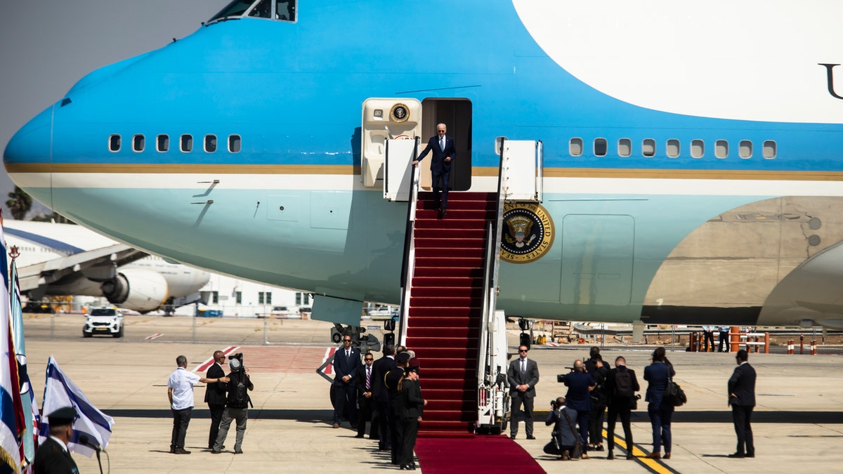 President Joe Biden descends from Air Force One