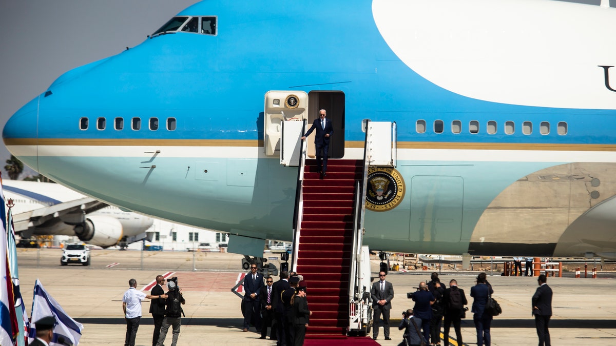 President Joe Biden descends from Air Force One