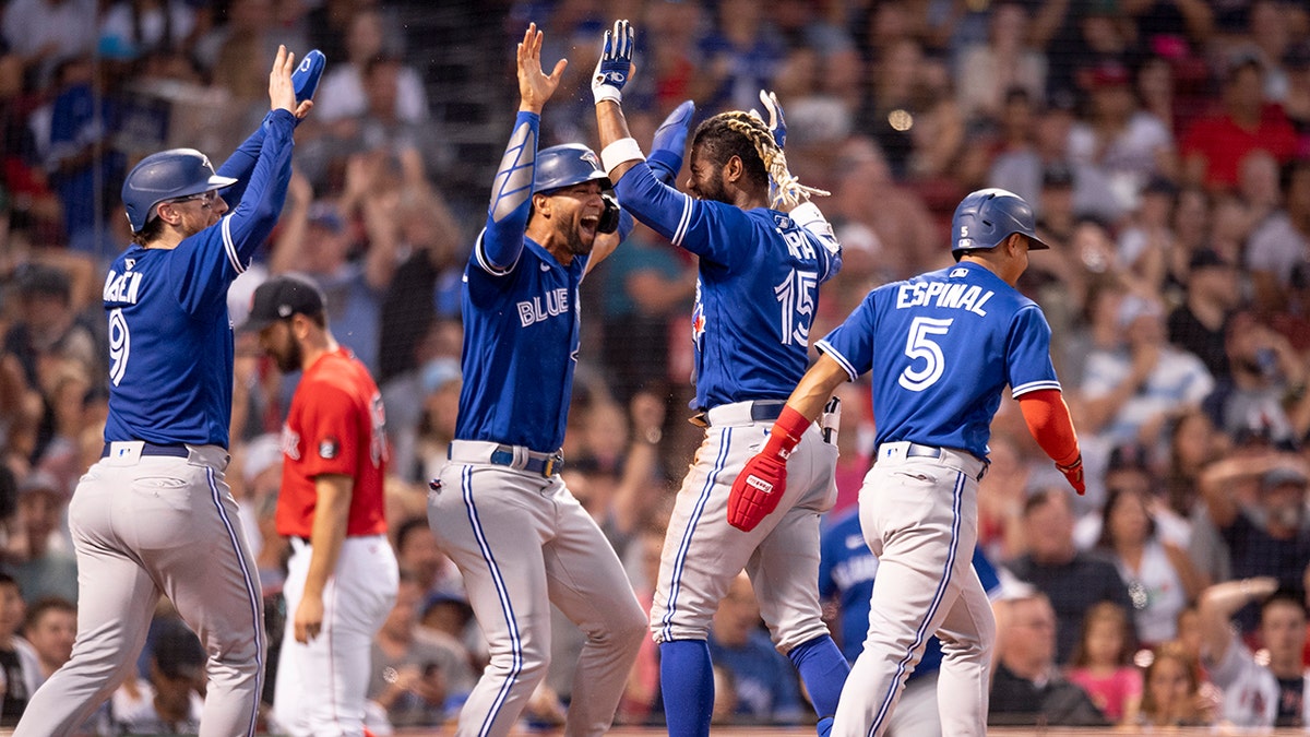 Raimel Tapia celebrates hit