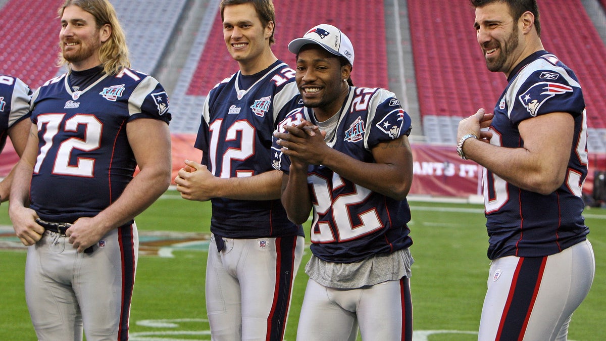 Asante Samuel, Tom Brady and other Patriots players at a media day