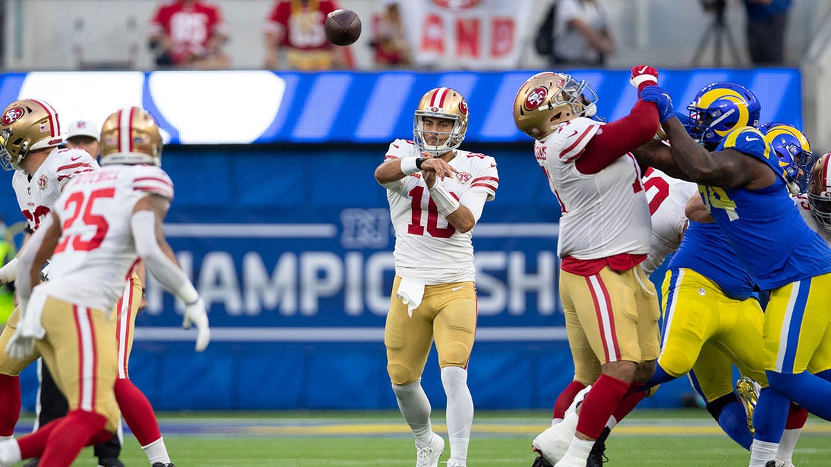 Jimmy Garoppolo attempts a pass in the NFC Championship Game 