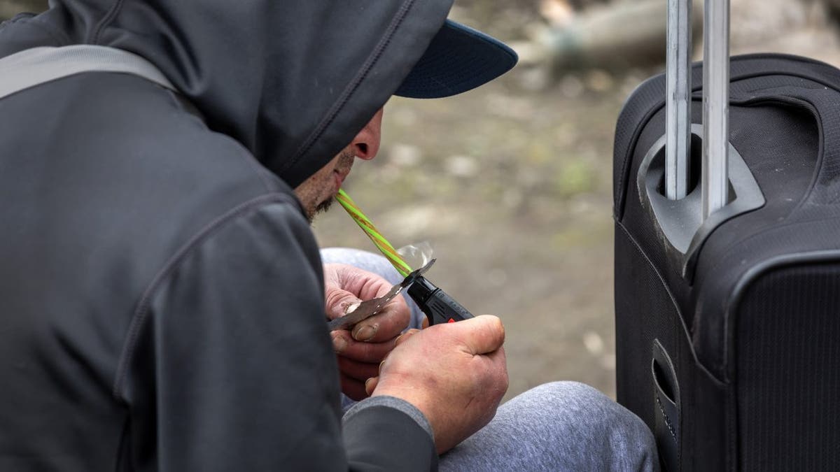 Homeless man in Seattle smoking fentanyl