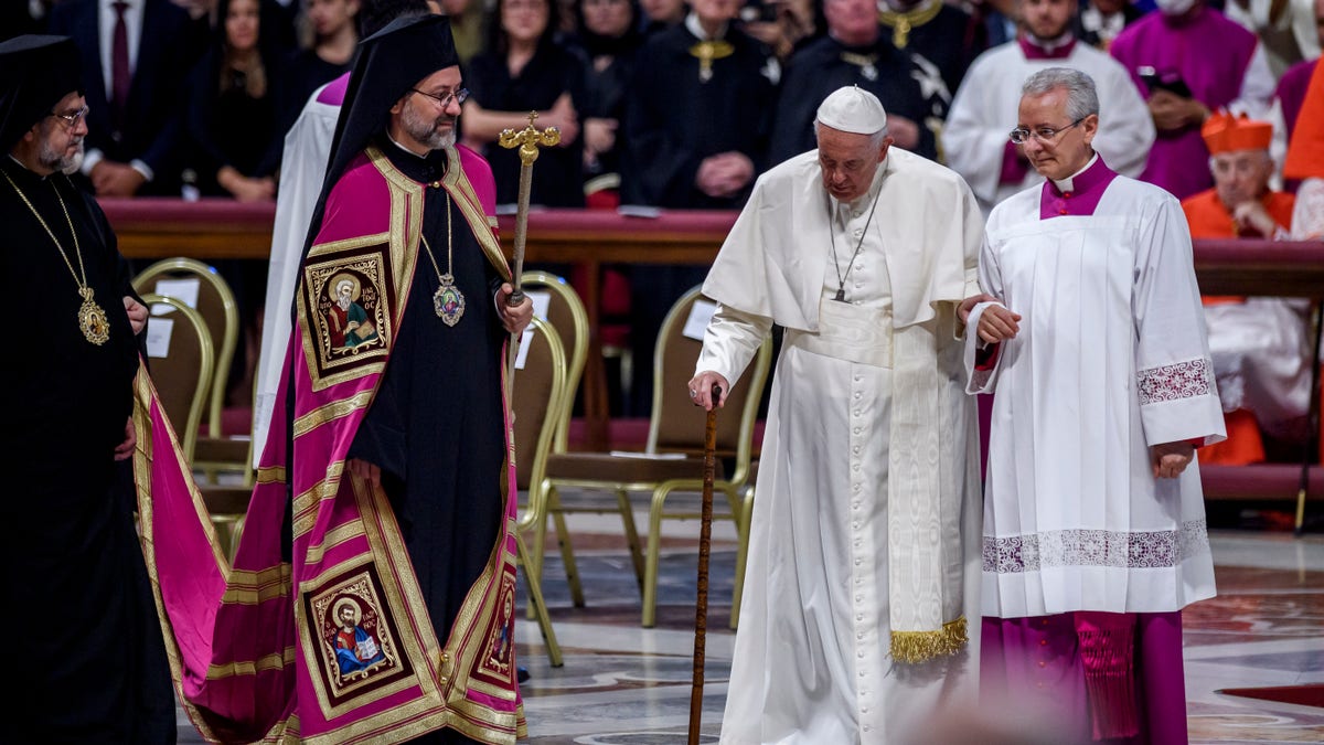 The pope exiting Vatican Basilica